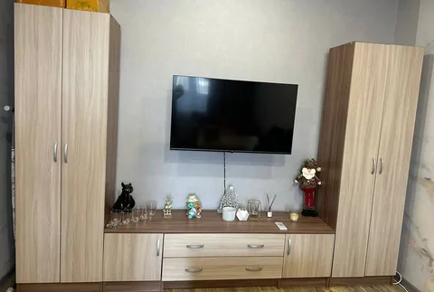 Стенка для гостиной в бежевом цвете с двумя шкафами и тумбой под ТВ - Мебель в Новокузнецк