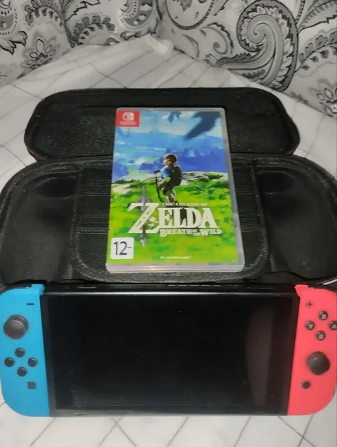 Продам Nintendo Switch с кейсом и Zelda Breath of the Wild - Портативные колонки в Новокузнецк