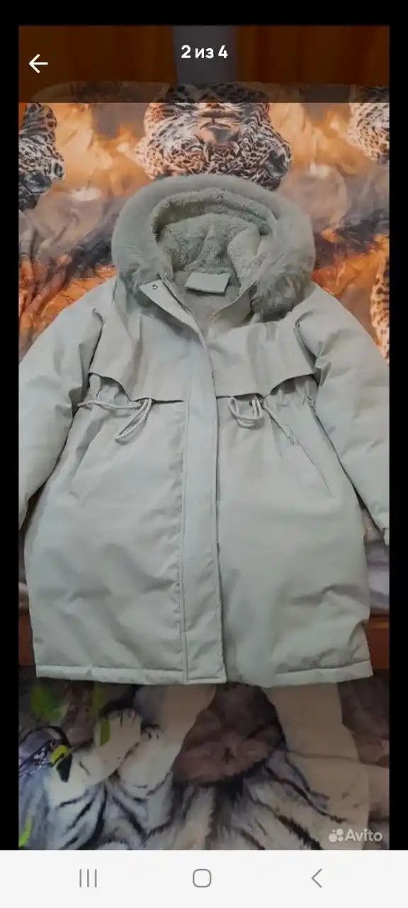 Продам пуховик светло-зеленый