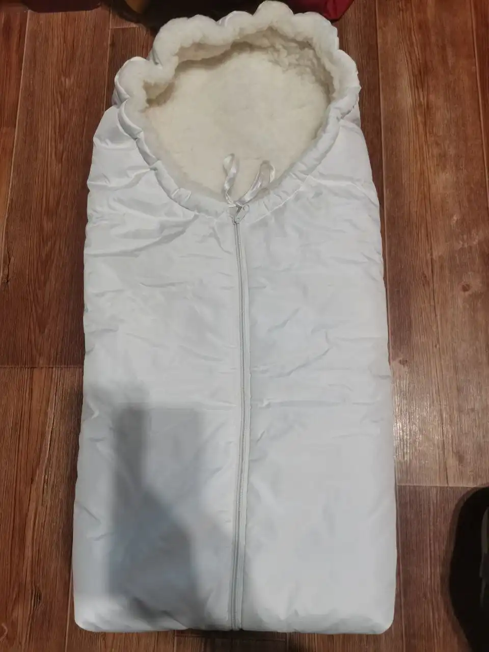 Зимний конверт на овчине для новорожденного