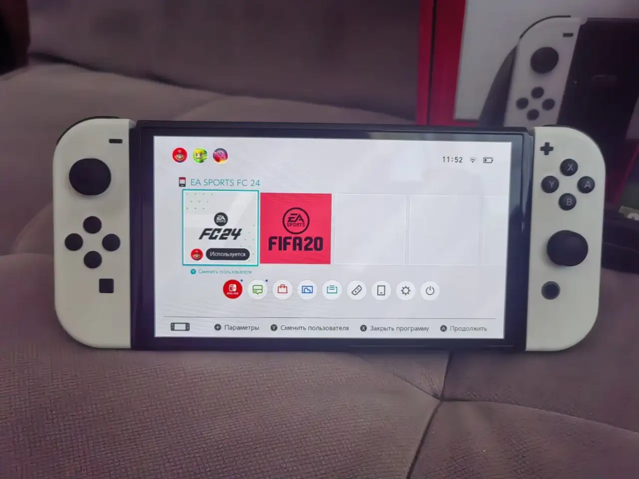 Nintendo Switch OLED 64GB с FIFA24 и аккаунтом, идеальное состояние - Игровые приставки (Электроника) в Краснодар