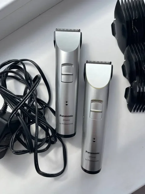 Две профессиональные беспроводные машинки для стрижки волос Panasonic ER1410 - Зарядные устройства в Краснодар