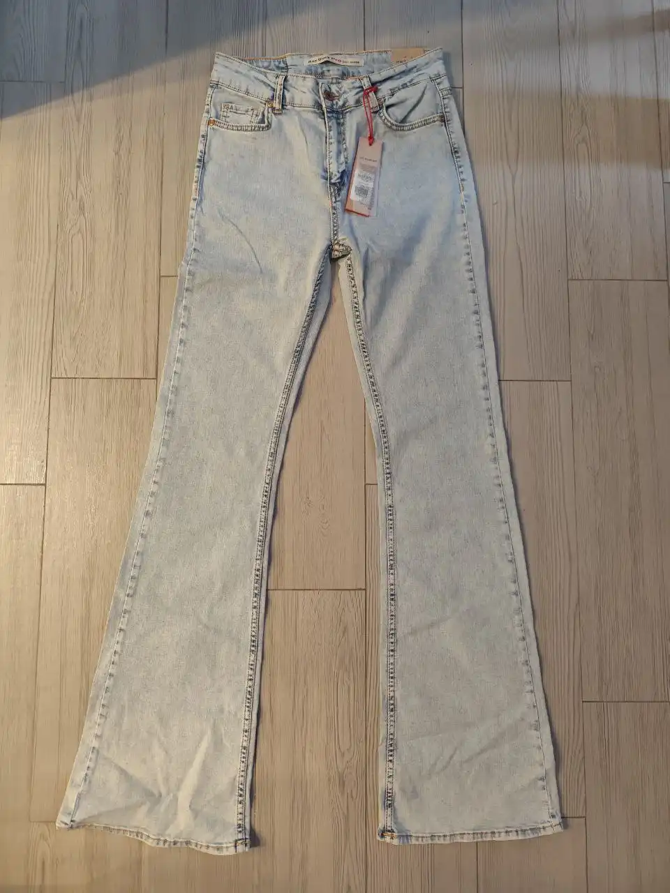 Новые джинсы клёш 44 размер