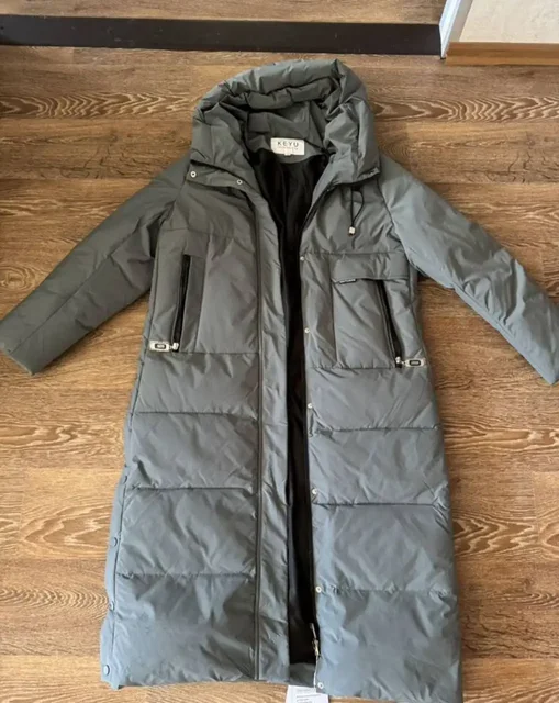 Продам новый пуховик 50 размера - Юбки в Москва