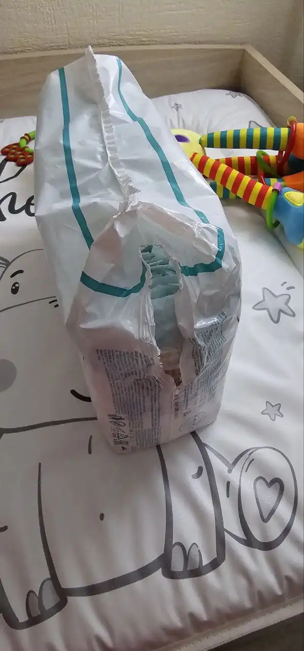 Памперсы для новорожденных, упаковка вскрыта - Памперсы и подгузники (Товары для детей) в Томск