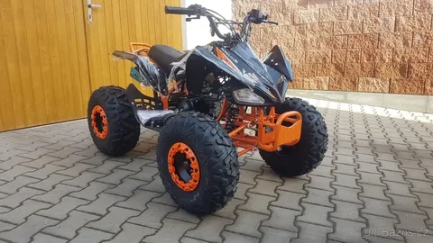 Продам квадроцикл ATV 125cc для детей - Книги/Комиксы в Томск