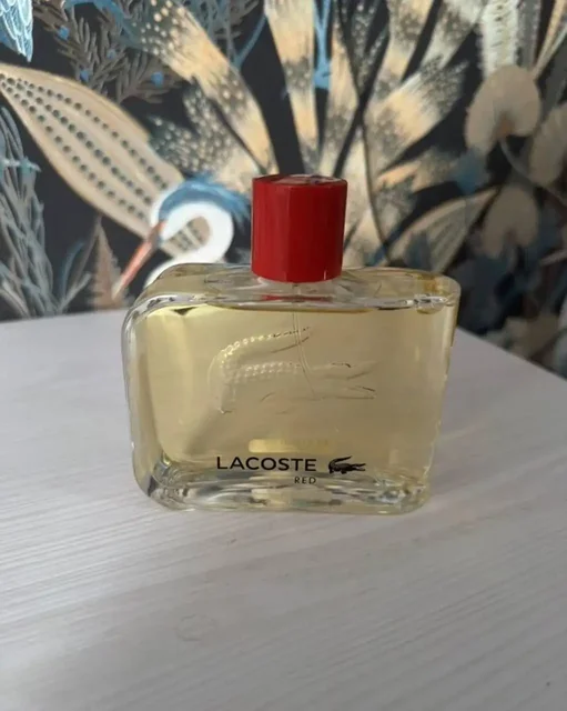 Продам мужские духи Lacoste Red - Линзы и оптика в Томск