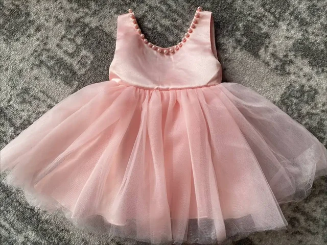 Платье для девочки розового цвета с бусинами - Коляски в Иркутск