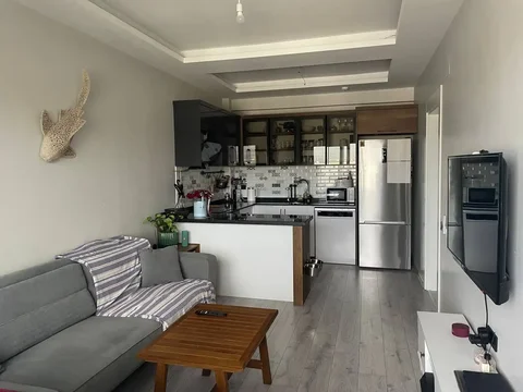 Продажа квартиры 1+1 в Мерсине, район Томюке - Недвижимость в Мерсин