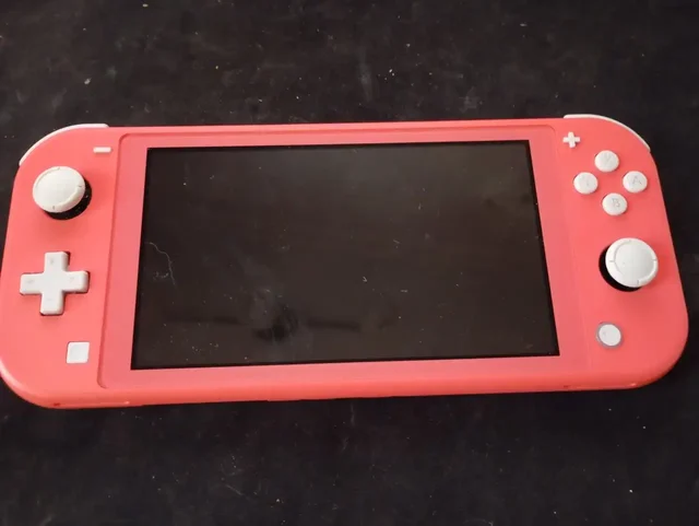 Nintendo Switch Lite Coral (розовый) - Наручные часы в Москва