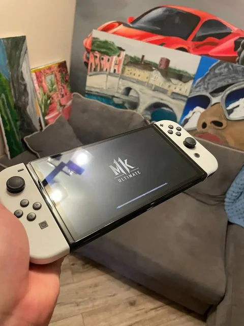 Продам Nintendo Switch OLED с джойконами, картой памяти 512GB и чехлом - Игрушки и игры в Москва