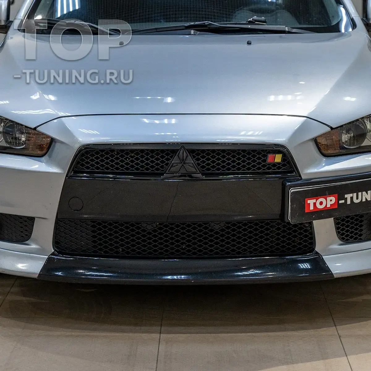 Новая накладка на передний бампер для Lancer X - Запчасти для иномарок (Авто) в Томск