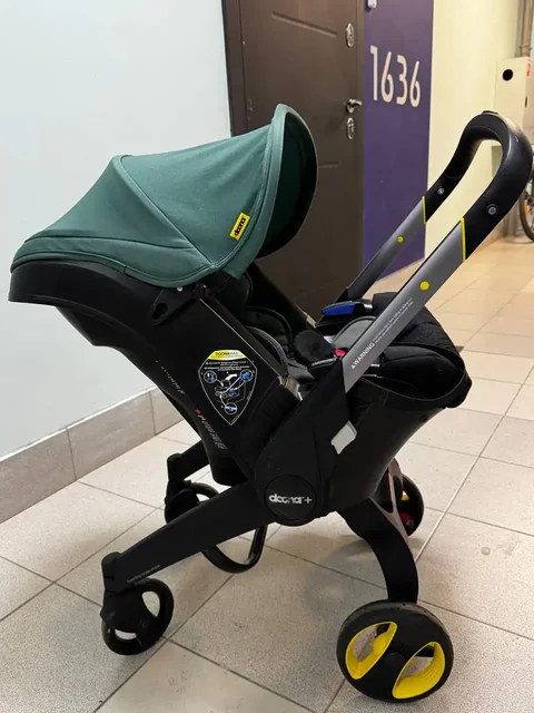 Продам коляску-автокресло Doona - Товары для детей в Королев