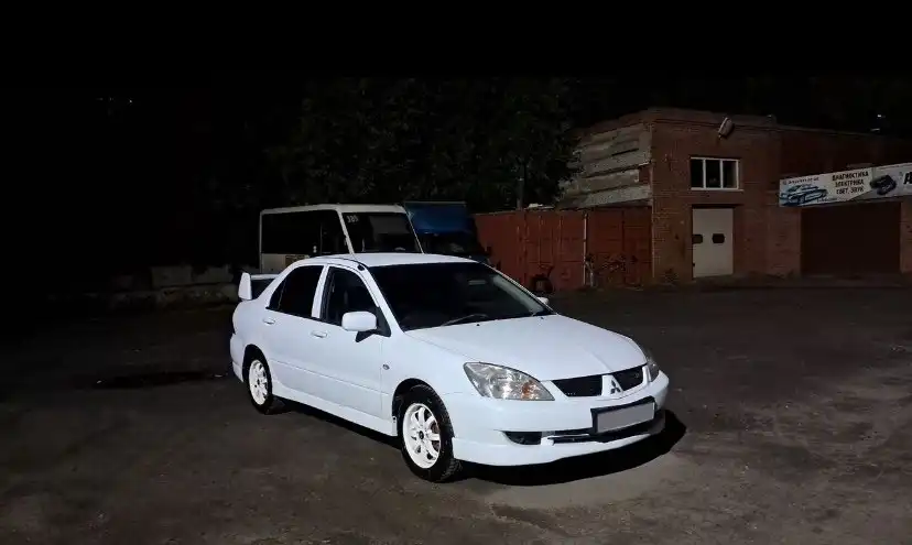 Продается Mitsubishi Lancer 2003 года в отличном состоянии