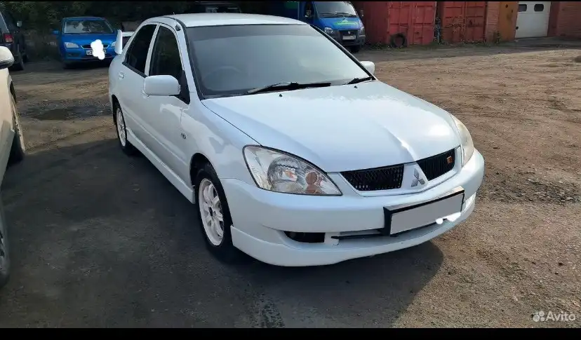Продается Mitsubishi Lancer 2003 года в отличном состоянии