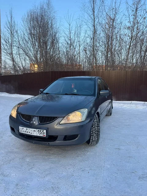 Продажа Mitsubishi Lancer 2004 года с АКПП - Внедорожники в Омск