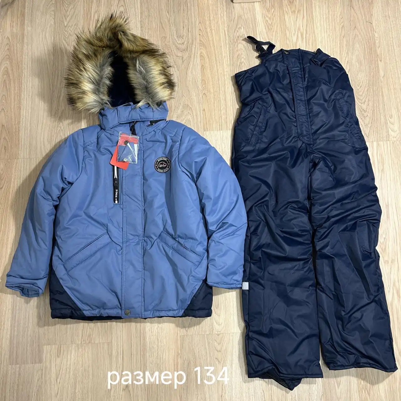 Комбинезоны и комплекты зимние новые