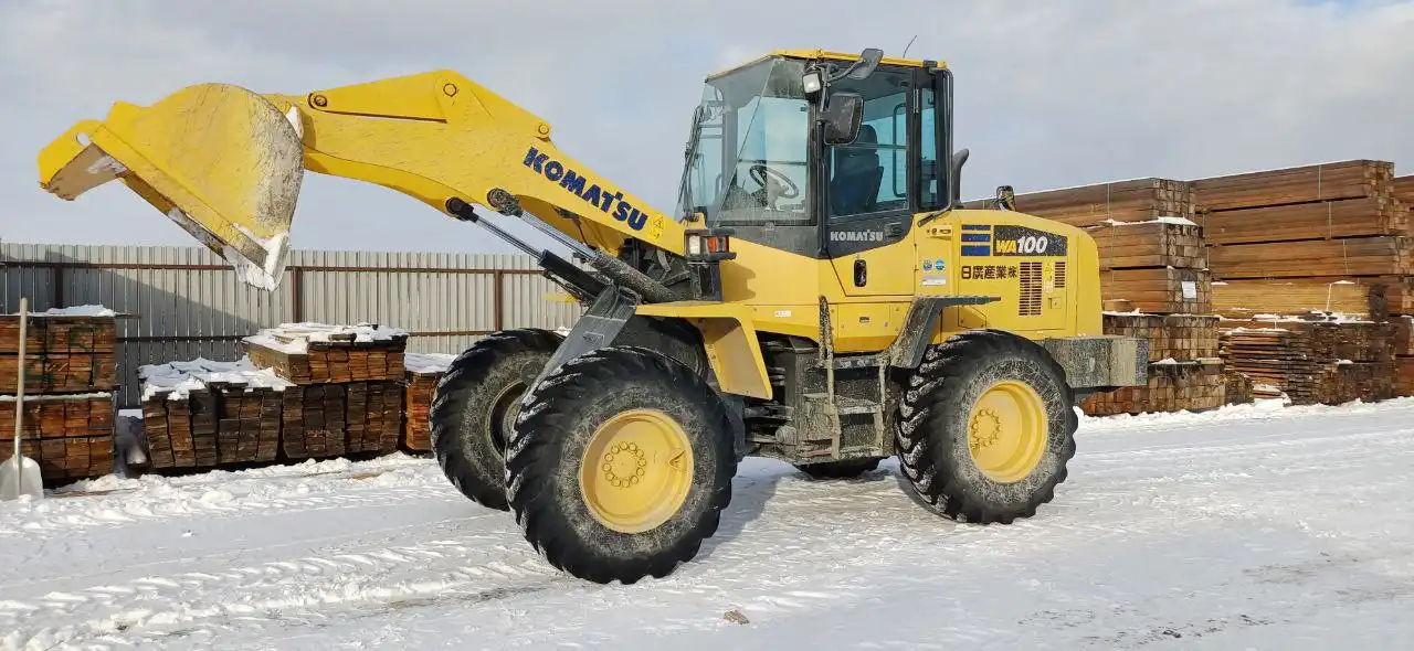 Расчистка снега фронтальным погрузчиком