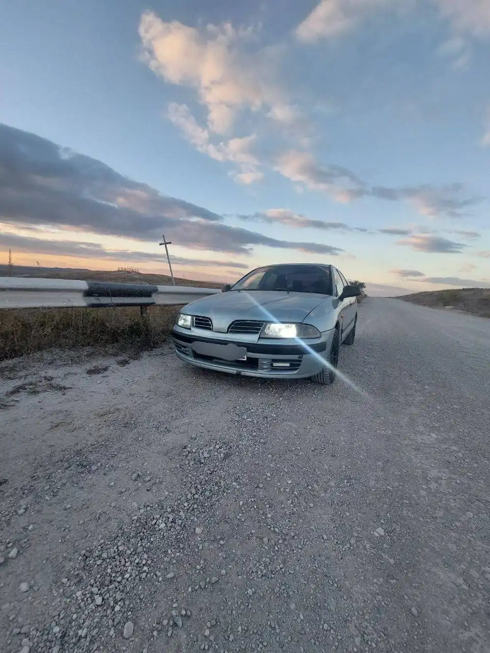 Mitsubishi Carisma 1.6 рест с заменой двигателя и дисками