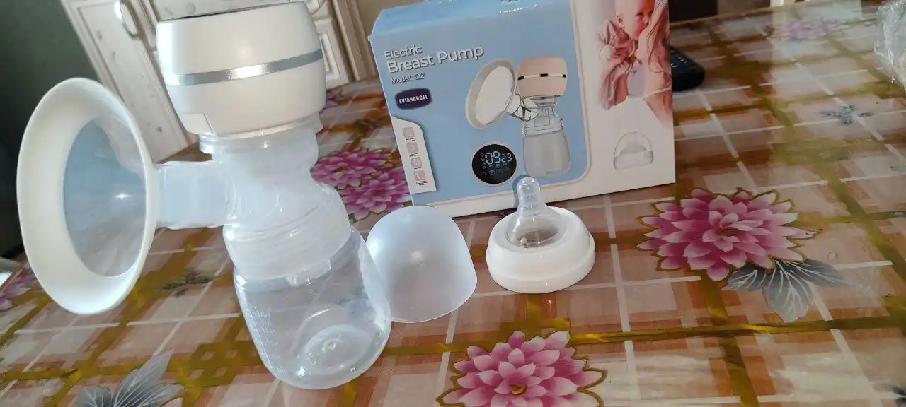 Электрический молокоотсос б/у