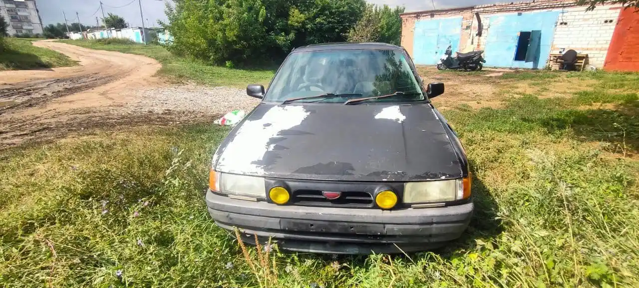 Mazda Familia 1992 года