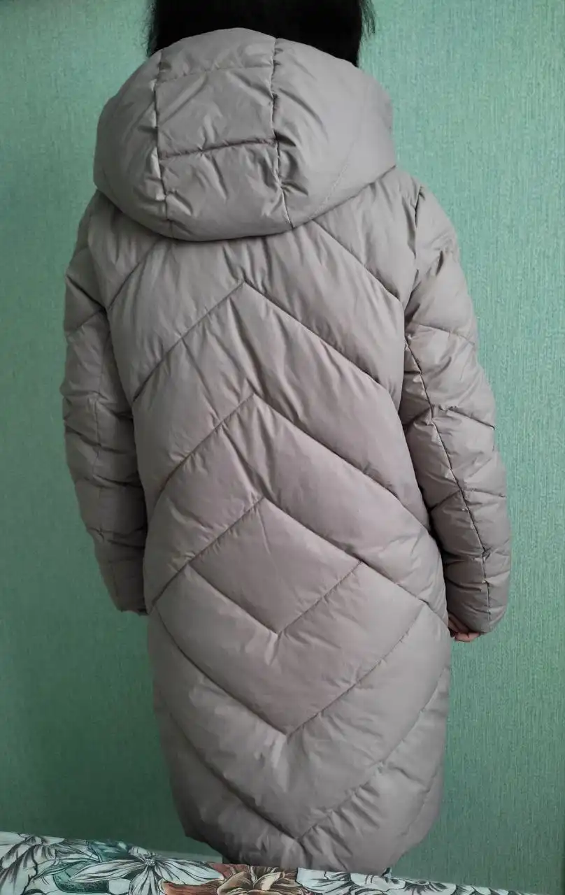 Новый пуховик 44 размера