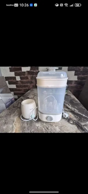 Стерилизатор и подогреватель для бутылочек BabyGo с зимним конвертом - Товары для детей в Подольск