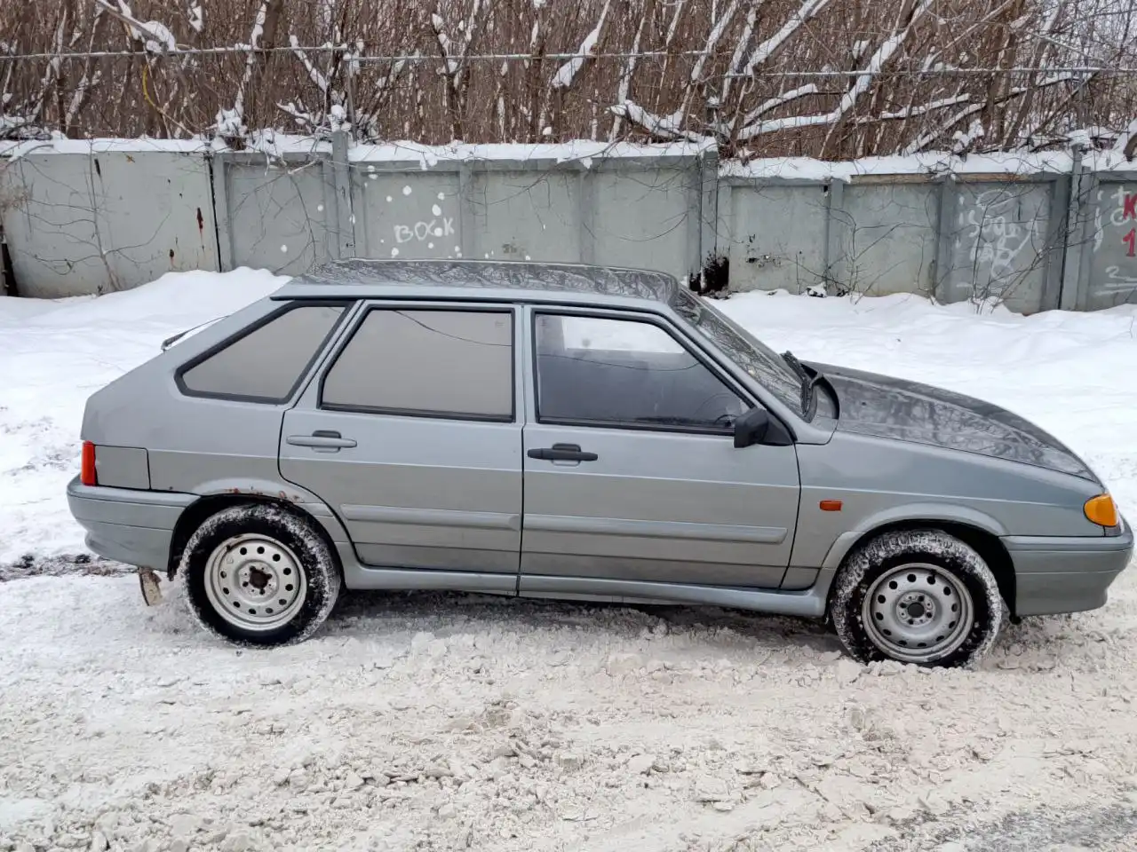 ВАЗ 2114 2011 года выпуска в Сером цвете