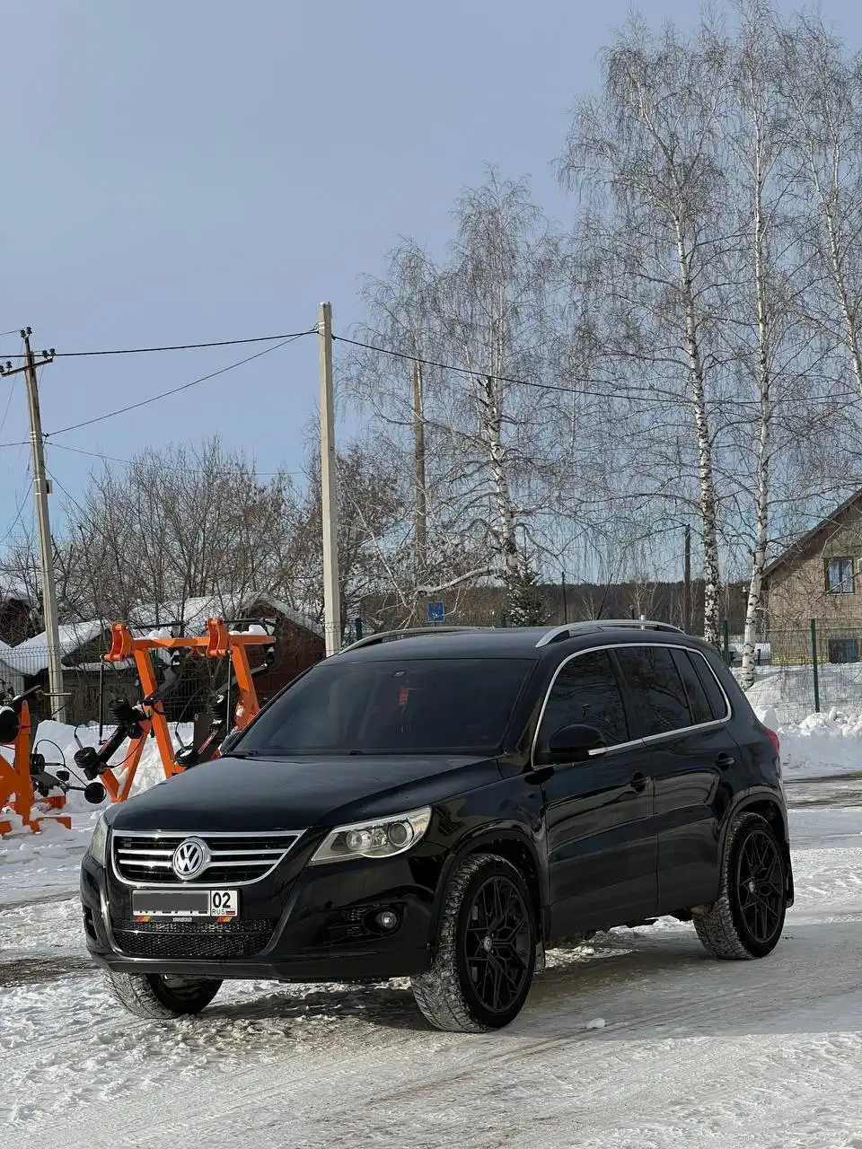 Volkswagen Tiguan 2011 2.0 автомат с зимним и летним комплектами колес - Легковые автомобили (Авто) в Уфа