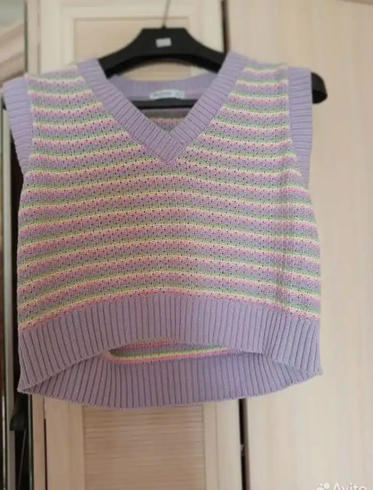 Вязаный жилет без рукавов