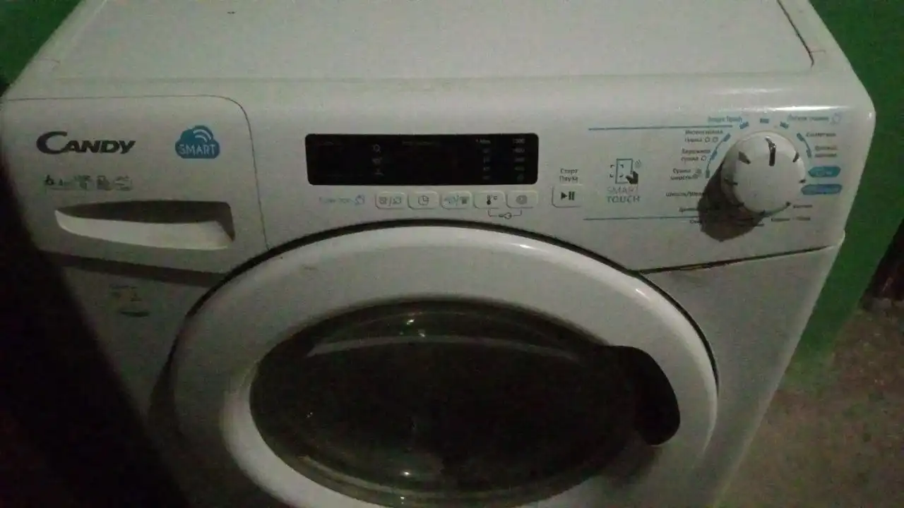 Стиральная машина Candy с сушкой и NFC