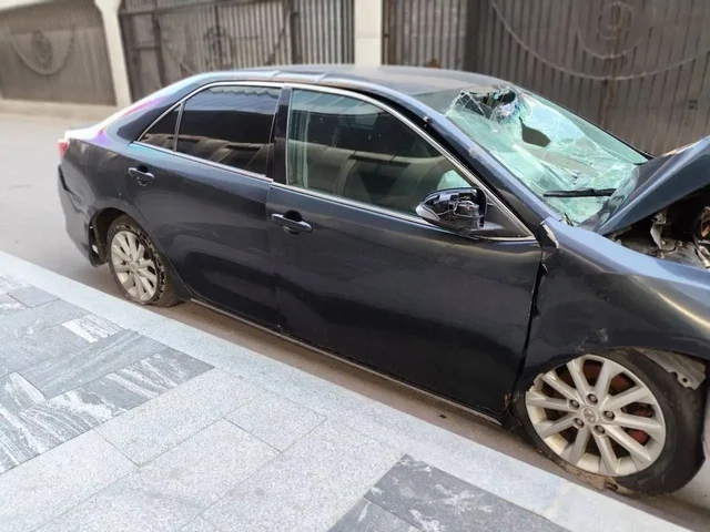 Toyota Camry 7 поколение 2012, битая - BMW X5 в Москва