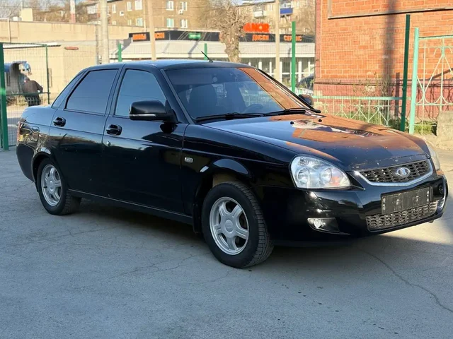 Lada Priora 2011 г.в. - Peugeot 206 в Неизвестно