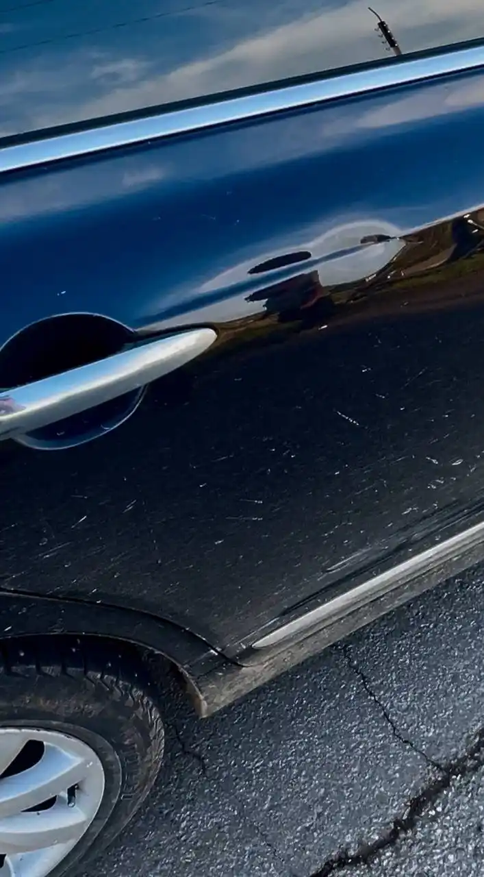 Устранение вмятины на двери Nissan Teana