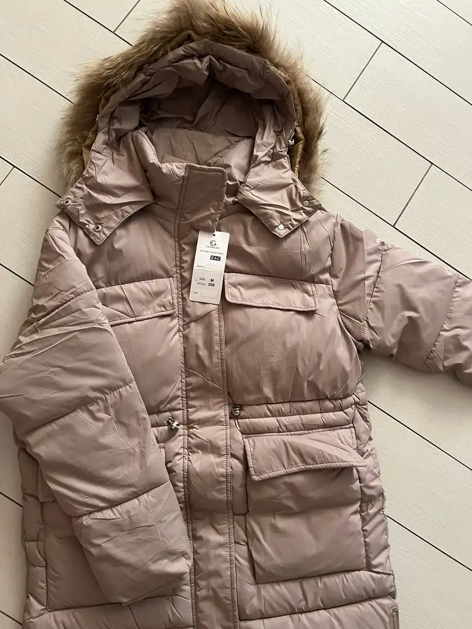 Новый зимний пуховик бежевого цвета, размер 44-46