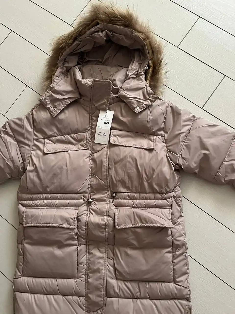 Новый зимний пуховик бежевого цвета, размер 44-46