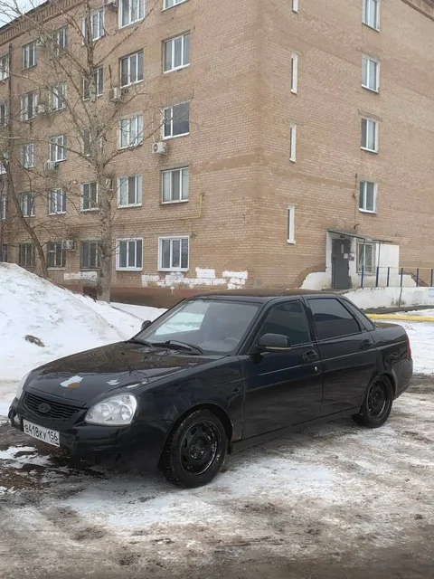 Продажа автомобиля Nissan Almera 2012 года, черный цвет - Lada Priora в Оренбург