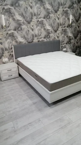 Стильная двуспальная кровать с мягким изголовьем и эффектом парения - Сантехника в Самара