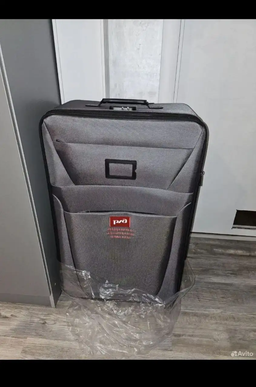Новый серый чемодан с биркой - Чемоданы (Барахолка) в Чебоксары