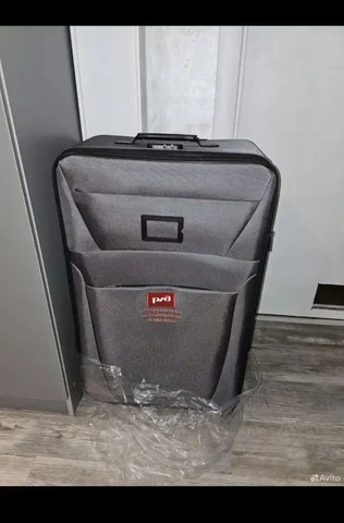 Новый серый чемодан с биркой - Продукты питания в Чебоксары