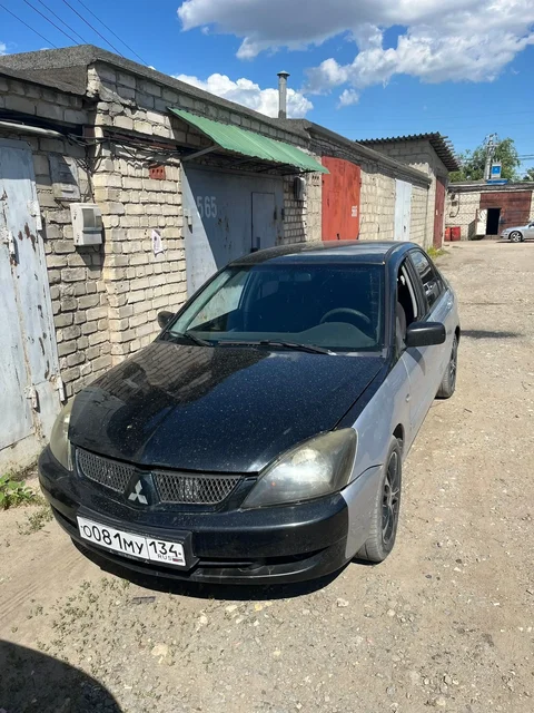 Mitsubishi Lancer 9 2005 за 225 000 руб. - Renault Logan в Волгоград