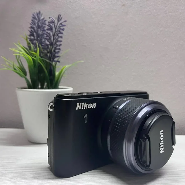 Продам фоторобота Nikon 1s1 - Наушники в Ижевск