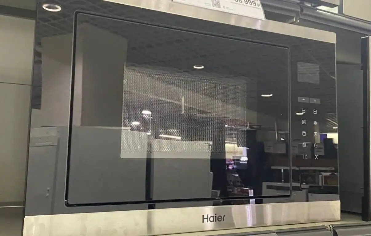 Продам микроволновую печь Haier HMX-BTG259X