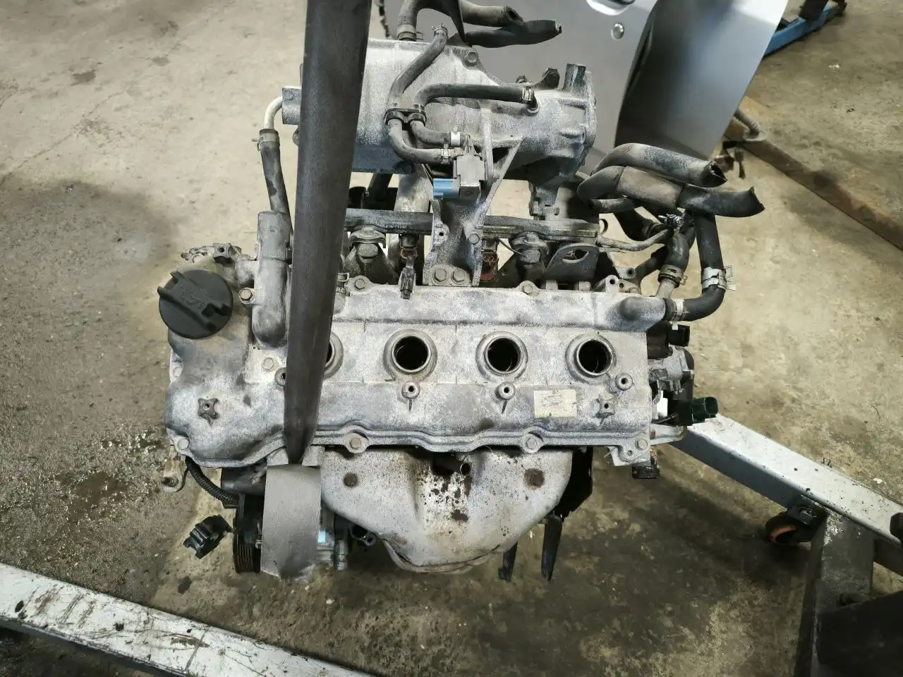 Продается двигатель QG15DE рест для электро дросселя