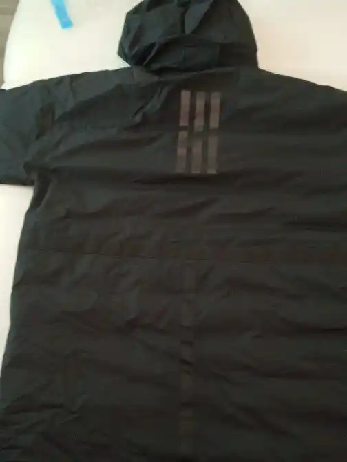 Мужской пуховик новый