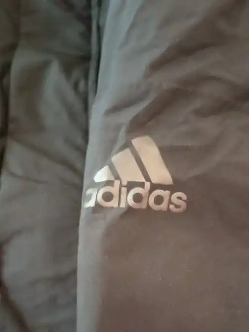 Мужской пуховик новый