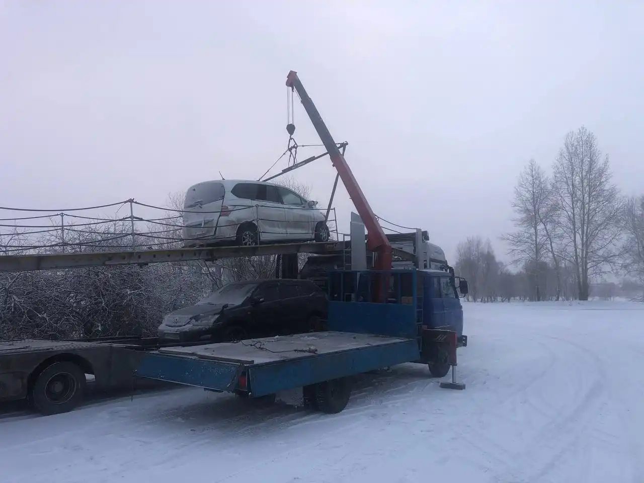 Услуги эвакуатора в зимний период