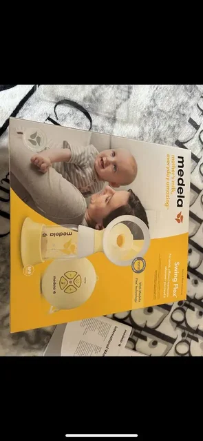 Молокоотсос Medela Swing Maxi электронный портативный - Товары для детей в Владивосток
