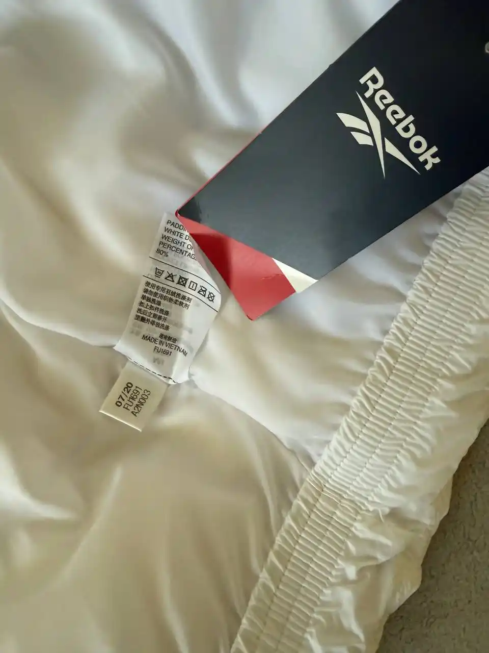 Пуховик Ребок