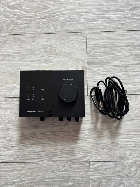 Продам звуковую карту Komplete Audio 1 - Сим-карты в Владивосток